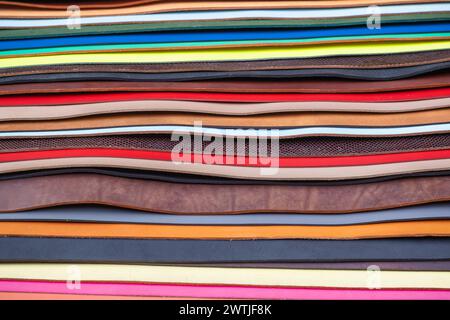 Selection of coloured or tanned leather on display at Camden market in London Stock Photo