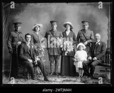 Edmund Colin Nigel Robinson and Mary Robinson with their wedding party studio portraits, black-and-white negatives, gelatin dry plate negatives, group portraits Stock Photo