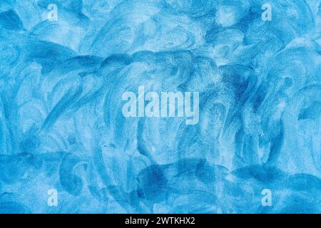 Abstract Dark blue toned painted congrete wall texture as background. Stock Photo