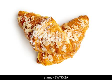 Indulge in the luxurious sight of two croissants filled with aromatic vanilla cream and adorned with crunchy almond flakes, elegantly stacked on white Stock Photo