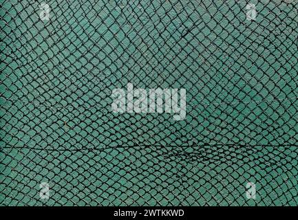 Green mesh, rhombus grid on green background Stock Photo