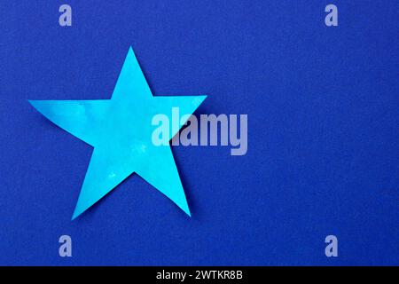 Celestial star on deep blue background Stock Photo