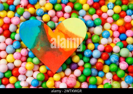 Colorful heart on many different colored spheres Stock Photo