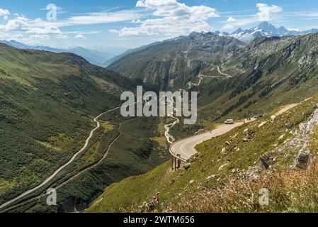 View from the Furka Pass into the Rhone Valley, in the background the serpentines of the Grimsel Pass road, Obergoms, Canton of Valais, Switzerland Stock Photo