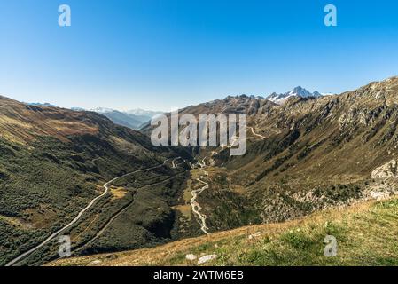 View from the Furka Pass into the Rhone Valley, in the background the serpentines of the Grimsel Pass road, Obergoms, Canton of Valais, Switzerland Stock Photo