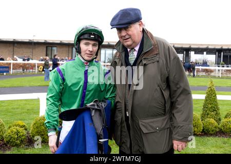 Jockey Colin Keane (left) and trainer Noel Meade after winning the Finlay Volvo Fillies Maiden with Mayfair ridden with horse Money Dancer during St. Patrick's Festival Race Day at Curragh Racecourse, County Kildare. Picture date: Monday March 18, 2024. Stock Photo