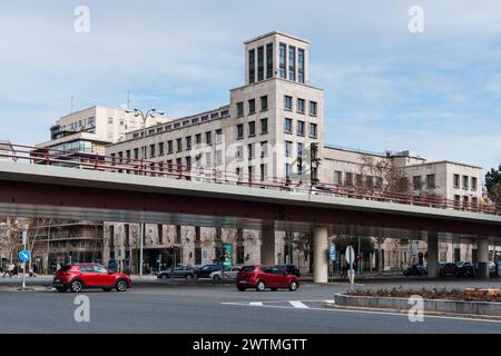Madrid, Spain - February 11, 2024: Castallana Avenue, overpass and AESA building Stock Photo