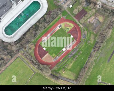 Aerial drone top down view on sports field, amateur sports grounds. Birds eye top down overview. Recreation leisure and health lifestyle. Stock Photo