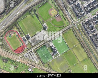 Aerial drone top down view on sports field, amateur sports grounds. Birds eye top down overview. Recreation leisure and health lifestyle. Stock Photo