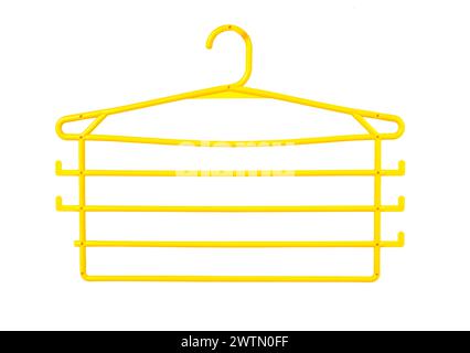 yellow hanger trempel organizer multi-tiered for clothes isolated on white background. Stock Photo
