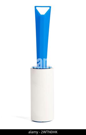 Roller for cleans clothes Isolated on white background. Adhesive lint roller Stock Photo