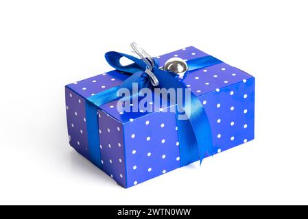Blue Gift Box With blue Ribbon and toy on white Background. Christmas present box. Stock Photo