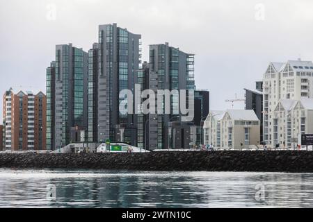 Reykjavik, Iceland - April 4, 2017: Urban skyline with tall modern buildings. Coastal cityscape of Reykjavik central district, the capital city of Ice Stock Photo