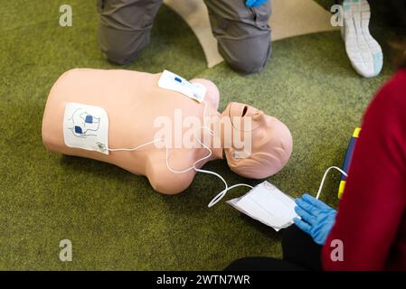 Emergency course of cardiopulmonary resuscitation using an automated external defibrillator, AED Stock Photo