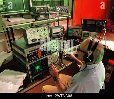 Electronics. Computers. Technician using Network Analyzer. Stock Photo