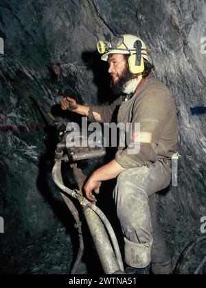 Australia. Industry. Coal mining. Man drilling for core samples. Stock Photo