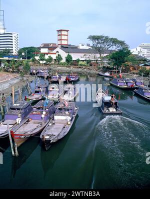 Fishing boats on Malacca River. Stock Photo