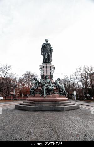 Munich, Germany - December 25, 2021: At Munich's most popular upscale shopping destination, the imposing statue of King Maxmillian II dominates the sq Stock Photo