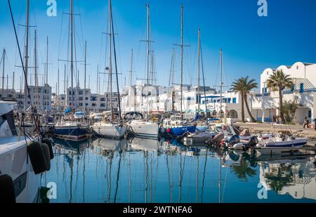 Yachts, sailing boats and motor cruisers moored in the Cape Monastir Marina, Monastir, Tunisia Stock Photo