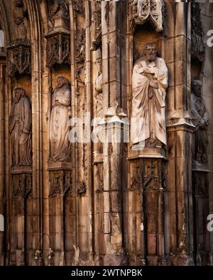The decorative facade of the Aix Cathedral (Cathédrale Saint-Sauveur d'Aix-en-Provence) in Aix-en-Provence in southern France. Stock Photo