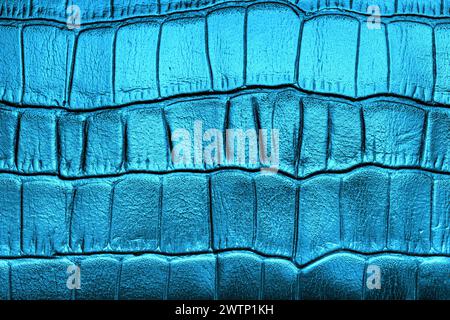 Natural leather with a geometric pattern, dyed blue. Macro photography of skin texture Stock Photo