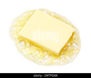 Butter melting isolated on white background Stock Photo