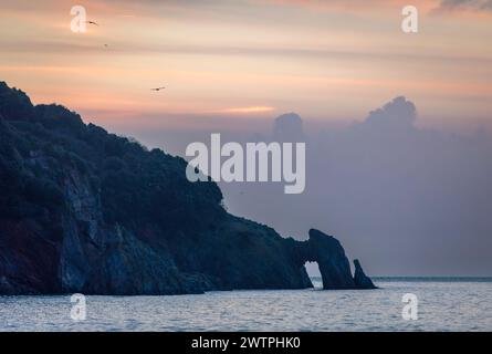 London Bridge sea stack on the Torquay coast south Devon Stock Photo