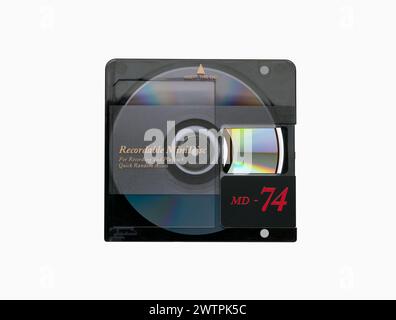 Minidisc with open security flap and rainbow reflection from disk surface isolated on white background Stock Photo