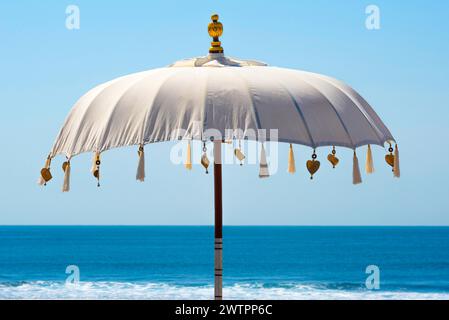 Traditional Balinese temple sunshade as parasol, sun, Hinduism, symbol, beach holiday, protection, sun protection, Balinese, culture, white, white Stock Photo