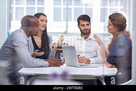 Teamwork, business people and meeting in boardroom for collaboration, planning or review. Workplace, technology and diverse group of employees Stock Photo