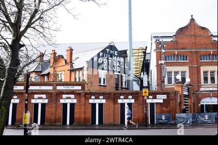 The Putney End of Craven Cottage football ground home of Fulham FC and turnstiles seen from the local streets around West London UK Stock Photo