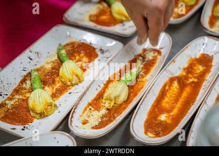 Two plates on platters placed on a table Stock Photo