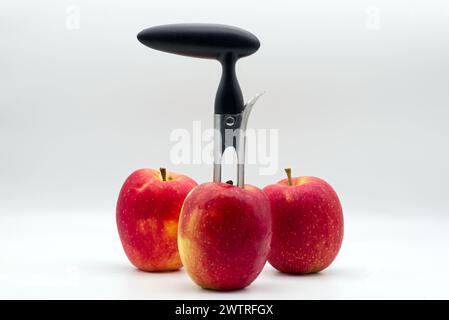 Apple corer. Tool for removing the apple core on white background. Stock Photo