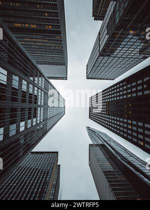 View of skyscrapers from a unique bottom-up perspective against the sky Stock Photo