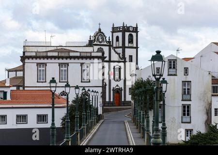 View of Nordeste old stone arch bridge in Nordeste village with white town buildings on the island of Sao Miguel, Azores, Portug Stock Photo