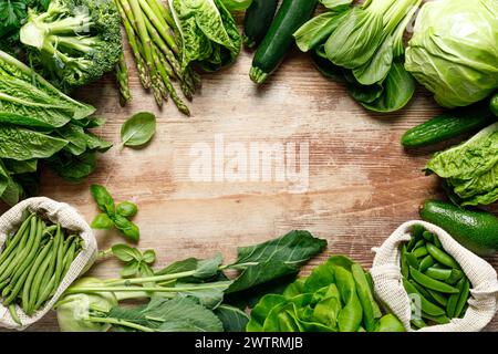 Vegetables background. Various vegetables on kitchen table. Clean eating, healthy food concept, flat lay, top down view Stock Photo