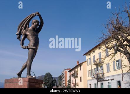 war memorial statue (monumento ai caduti) in Porto Ceresio, a village on Lake Lugano - Varese province - Lombardia - Italy Stock Photo