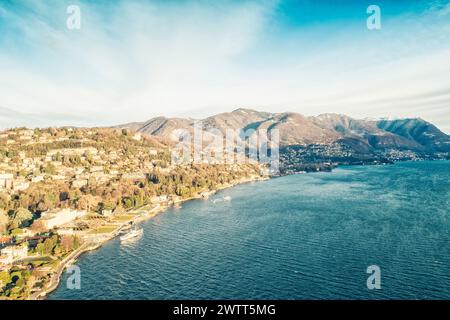 Aerial view of the cityscape of  Como at sunrise with villas and traditional houses Stock Photo