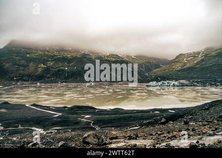 Lake formed from the melting Solheimajökull glacier in the south of Iceland Stock Photo