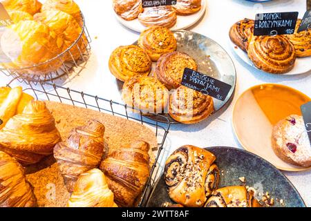 Assorted pastries on display at a cozy bakery Stock Photo