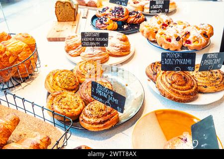A delicious display of freshly baked pastries at a bakery counter Stock Photo