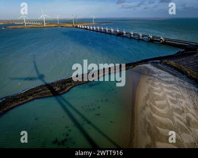 Neeltje Jans is part of the Eastern Scheldt storm surge barrier. Aerial view of the bridge and wind turbines Stock Photo