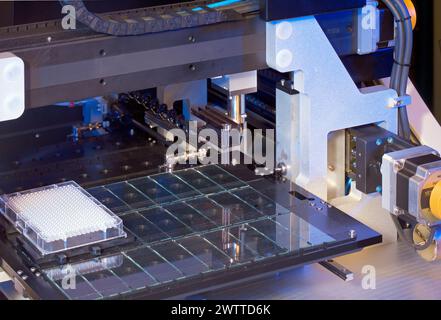 Precision robotics at work in a high-tech laboratory Stock Photo