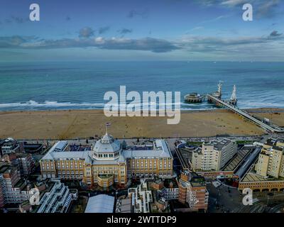 Aerial view of the urban landscape at dusk, featuring dense buildings ...