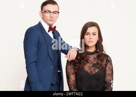 Couple posing in formal attire Stock Photo