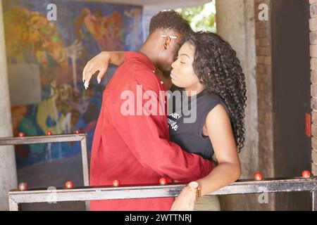 Couple embracing in an art gallery Stock Photo
