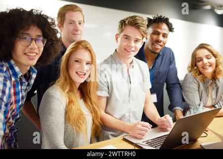 Group of young professionals at a meeting Stock Photo