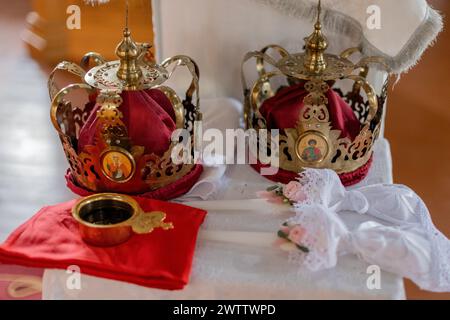 an Orthodox wedding crowns and icons, essential in traditional marriage ceremonies. Representative of unity and spiritual commitment Stock Photo