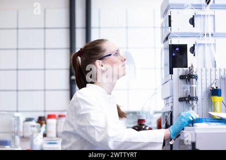 Scientist conducting research in a laboratory Stock Photo