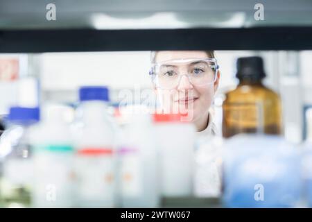 Focused researcher analyzing samples in a laboratory setting Stock Photo